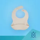 Canpol Babies silikonowy śliniak z kieszonka 51/030  CREME