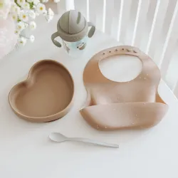 Canpol babies śliniak silikonowy z kieszonką DOTS 51/029 beż